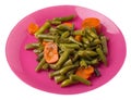 Green beans with garlicand carrots  on a plate isolated on white background.green beans with carrot top view. healthy  food Royalty Free Stock Photo