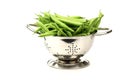 Green beans in a metal colander