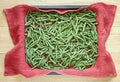 Green beans in metallic baking dish