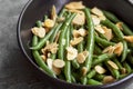 Green Beans with Toasted Almonds in Black Bowl Royalty Free Stock Photo