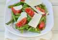 Green beans, tomato and cheese salad ..