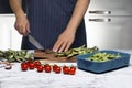 Green beans on wooden cutting board. Rustic wooden table Royalty Free Stock Photo