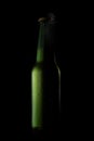Green beer bottle with drops Royalty Free Stock Photo