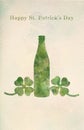 Green beer bottle and four-leaf clovers in watercolor painting.