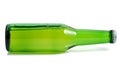 Green beer bottle in a horizontal position Royalty Free Stock Photo