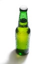 Green beer bottle with water drops Royalty Free Stock Photo