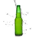 Green beer bottle with water splash Royalty Free Stock Photo