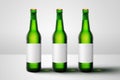 Green beer bottles with blank label mock-up advertising Royalty Free Stock Photo