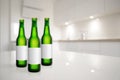 Green beer bottles with blank label mock-up in kitchen interior Royalty Free Stock Photo