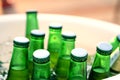 Green beer bottles in ice bucket Royalty Free Stock Photo