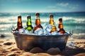 Green beer bottles in ice bucket on summer beach Royalty Free Stock Photo
