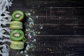 Green and beige macaroons tied with a tourniquet