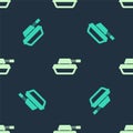 Green and beige Military tank icon isolated seamless pattern on blue background. Vector