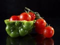 Green Bell Pepper and cherry tomatoes. Royalty Free Stock Photo