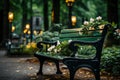 a green bench with flowers on it sitting in the middle of a park Royalty Free Stock Photo