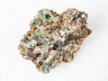 green beryl crystals in raw rock on white Royalty Free Stock Photo