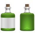 Green beverage in glass bottle