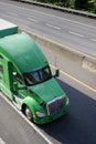 Green big rig semi truck for long haul cargo transporting dry va