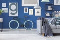 Green bike in apartment interior Royalty Free Stock Photo