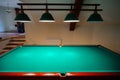 Green billiard table in private apartment