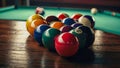 A green billiard table with three colorful balls, intricate corner detailing, and a blurred background featuring a bar Royalty Free Stock Photo