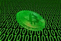 green binary code and a valueable green bitcoin from crypto currency oblique