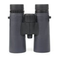 Green binoculars on white background.. optical device