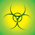 Green biohazard sign over yellow background