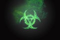 Green Biohazard Symbol on Black Background. Sign of biological hazard. The concept of chemical waste, pollution of the nature,