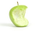 Green bitten apple on white Royalty Free Stock Photo