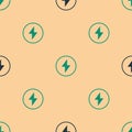 Green and black Lightning bolt icon isolated seamless pattern on beige background. Flash sign. Charge flash icon Royalty Free Stock Photo