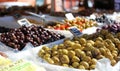 Green and black olives at a farmer market in France, Europe. Italian olive. Street French market at Nice. Royalty Free Stock Photo