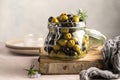 Green and black olives mix, in a glass jar. Delicious, marinated olives. Royalty Free Stock Photo