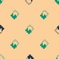 Green and black Puzzle pieces toy icon isolated seamless pattern on beige background. Vector Royalty Free Stock Photo