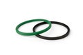 Green and black rubber gasket ring isolated on white background. Royalty Free Stock Photo