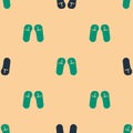 Green and black Slipper icon isolated seamless pattern on beige background. Flip flops sign. Vector Illustration Royalty Free Stock Photo