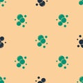 Green and black Soap water bubbles icon isolated seamless pattern on beige background. Vector