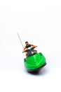 Green and Black Speed Boat Toy Isolated in White Background Royalty Free Stock Photo