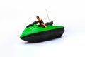 Green and Black Speed Boat Toy Isolated in White Background Royalty Free Stock Photo