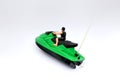 Green and Black Speed Boat Toy Isolated in White Background Royalty Free Stock Photo