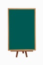 Green blackboard vertical with chalk and eraser on easel with back to school text on isolated background Royalty Free Stock Photo