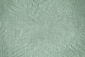 Green blank crumpled and grungy textured paper background Royalty Free Stock Photo