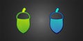 Green and blue Acorn icon isolated on black background. Vector Royalty Free Stock Photo