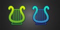 Green and blue Ancient Greek lyre icon isolated on black background. Classical music instrument, orhestra string