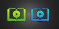 Green and blue Audio book icon isolated on black background. Play button and book. Audio guide sign. Online learning Royalty Free Stock Photo