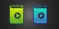 Green and blue Audio book icon isolated on black background. Play button and book. Audio guide sign. Online learning Royalty Free Stock Photo