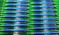 Green and blue ball pens as a background
