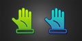 Green and blue Beekeeper glove icon isolated on black background. Vector