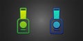 Green and blue Bottle of nail polish icon isolated on black background. Vector Royalty Free Stock Photo
