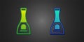 Green and blue Bottle of nail polish icon isolated on black background. Vector Royalty Free Stock Photo